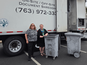 Christine Korpi and Sherry Valley during MNLB's Shred Day event.