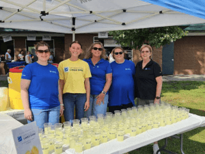 Team MNLB serving lemonade at Taste of Delano in Delano, MN.