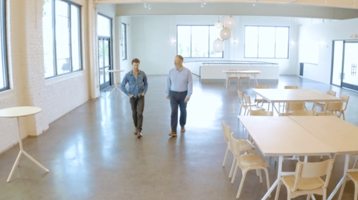 Levi Stugelmeyer and Josh Gehlen walking through The Lowlands Event Venue